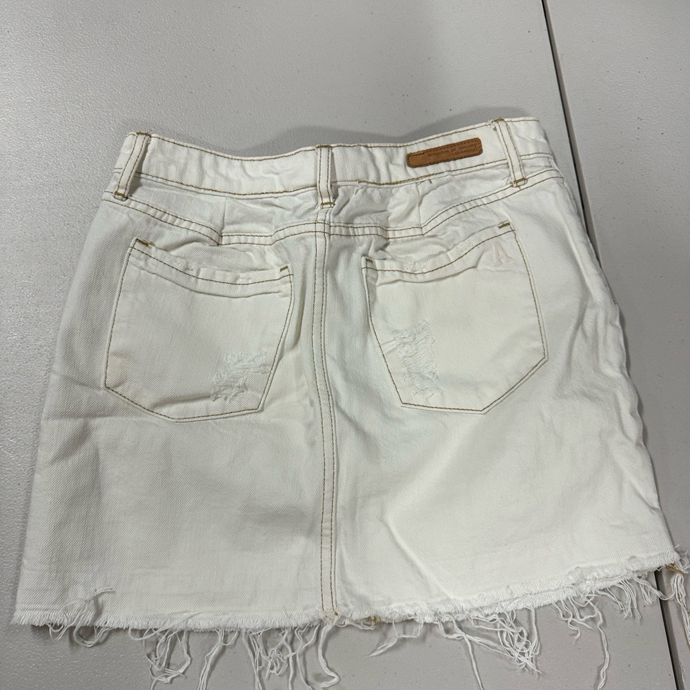 Articles of society, white denim, mini skirt